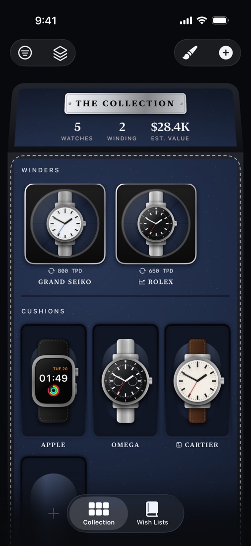 A collection of watches in Wox's navy-lined watch box, with two on winders